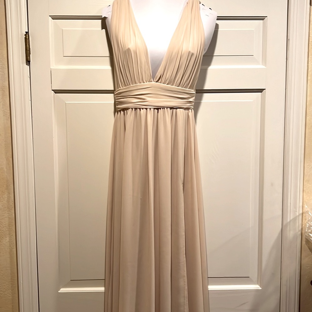 Gorgeous Crème colored gown, perfect for Fall and Winter wedding guest!